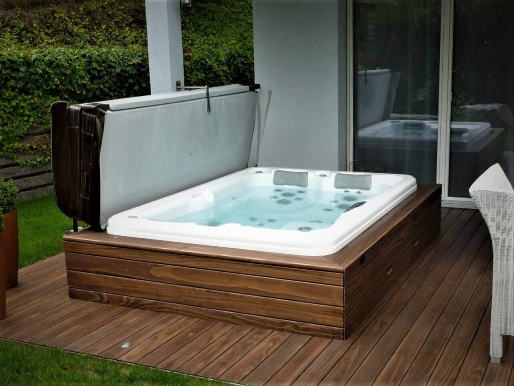 Accoya wooden decks with semi-submerged hot tub